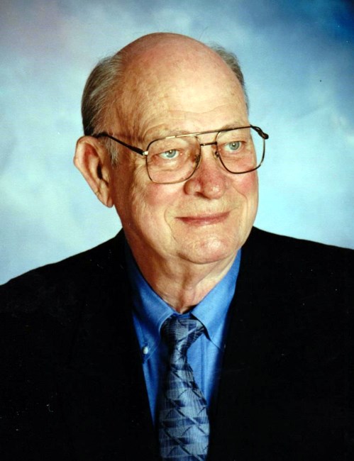 Obituario de George E. Hall