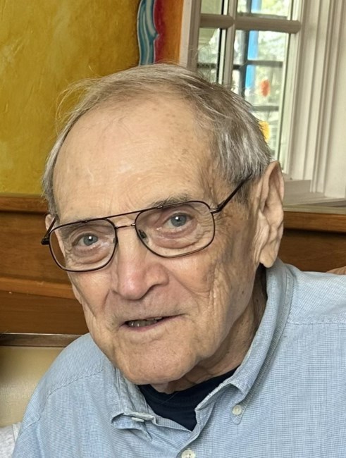 Obituary of John E Moore