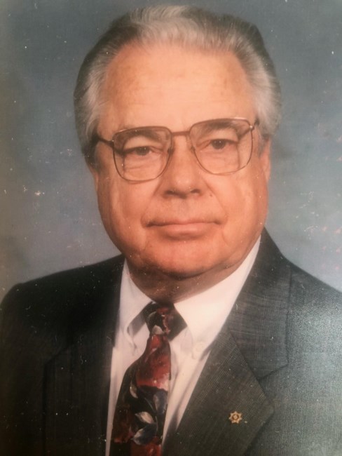 Obituary of Clarence Jordan "Larry" Beddome