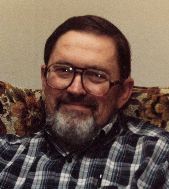 Obituary of Raymond G Woodman