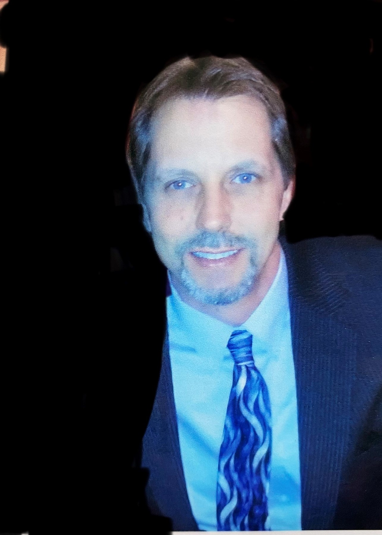 Obituary of David E. Stansfield