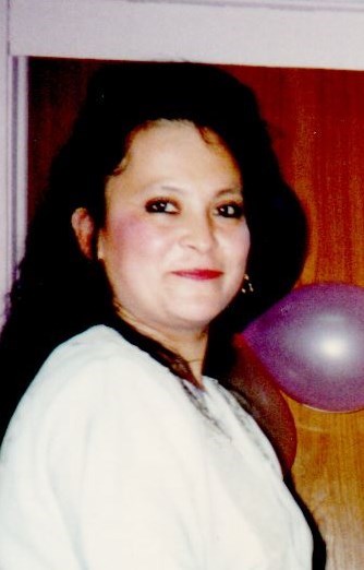 Obituario de Reina Cisneros