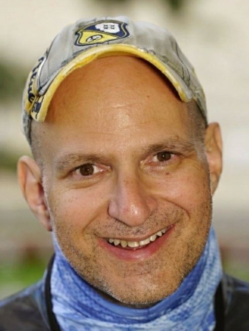 Obituario de Norman Perkel