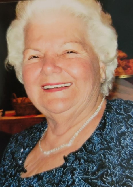 Obituary of Julia H. Brass Woodard Young