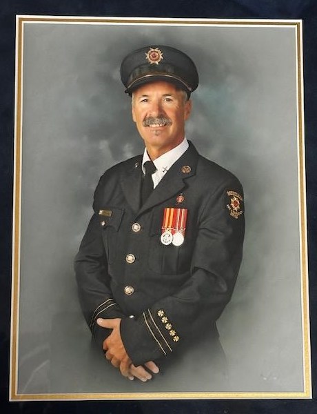 Obituary of John "Sully" Wayne Sullivan