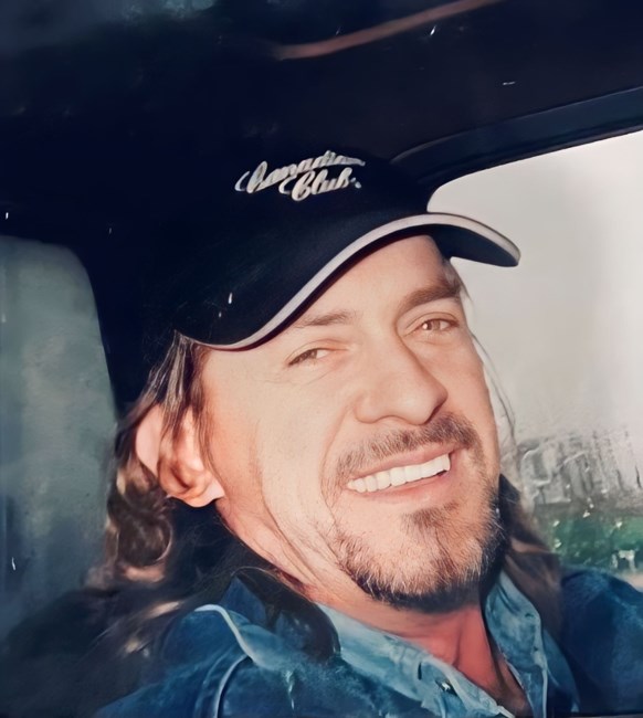 Obituary of John Wollf