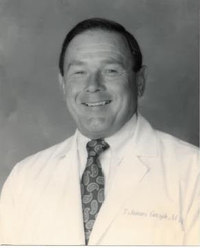 Obituary of T. James Guzik