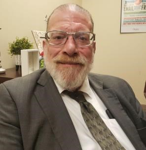 Obituary of John W. McQuery