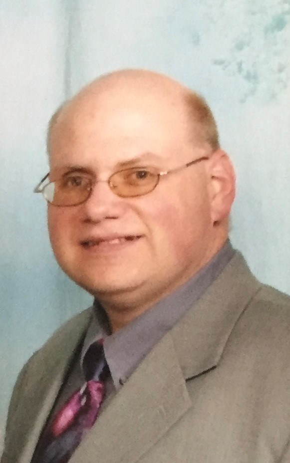 Obituary of Timothy J. Den Dooven