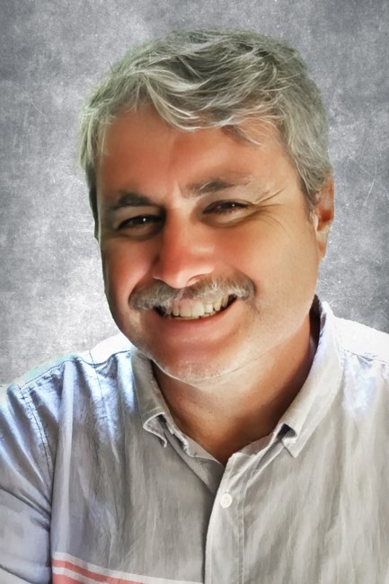 Obituary of Charles E. Smith Jr.