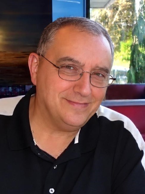 Obituary of John Hassen Ahmed