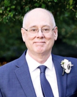 Obituary of Dudley Mark Thompson