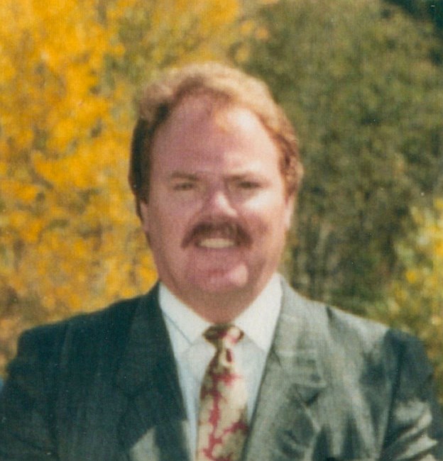 Obituary of Geoffrey L. May