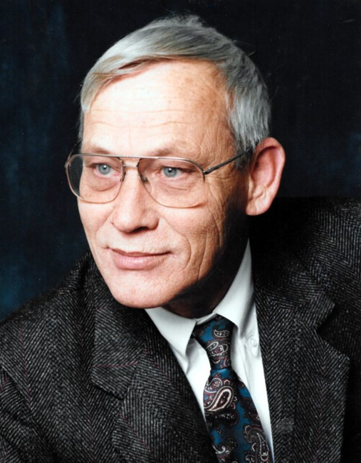 Obituario de Dr. John Flint Rhodes