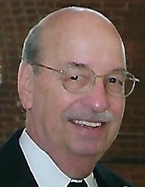 Obituary of DENNIS M. BUTCHER