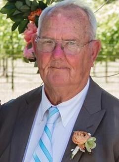 Obituary of Norman E. Minton
