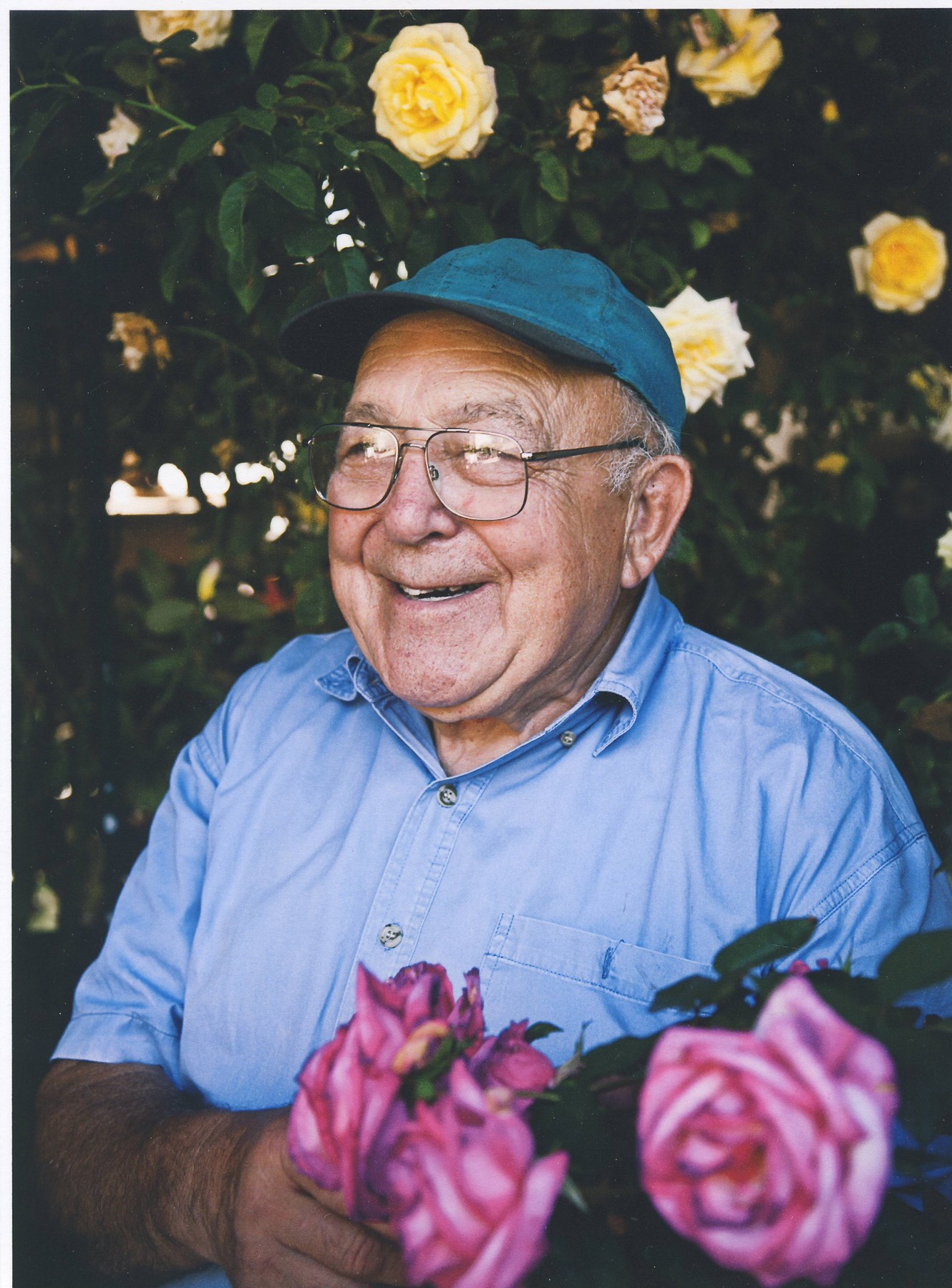 Obituary of Clarence Edward Rhodes