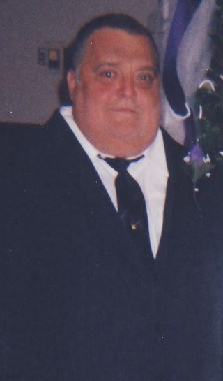 Obituary of George R Moore