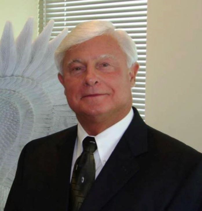 Obituary of John Edward Fuller