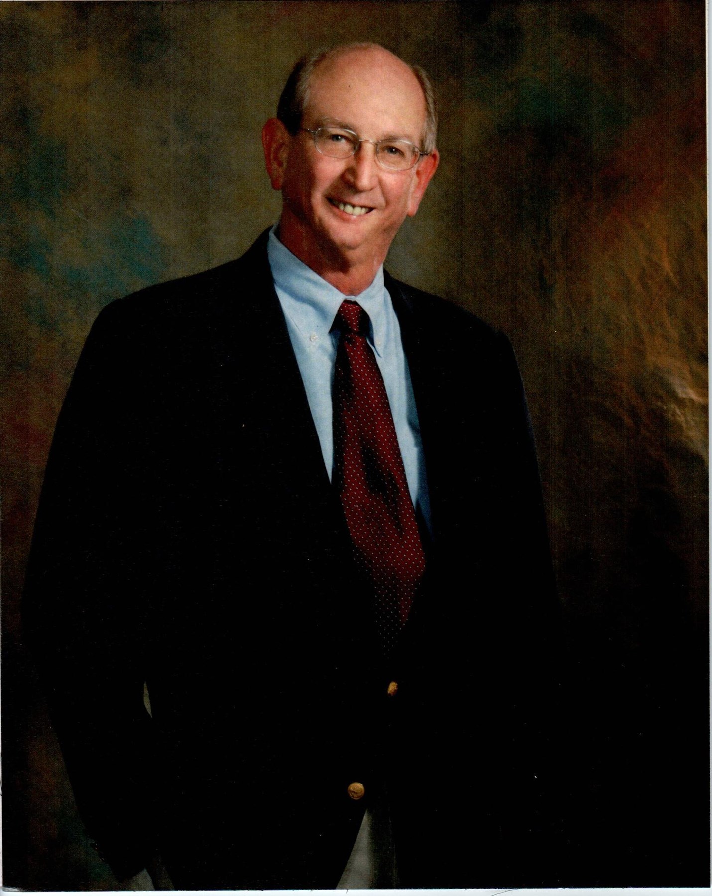 Obituary of Dr. Ken Earl Handley D.D.S.