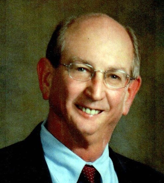 Obituary of Dr. Ken Earl Handley D.D.S.