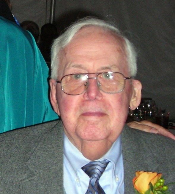 Obituary of Charles J. Holland, Jr.