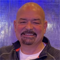 Obituary of Christopher E. Rhodes