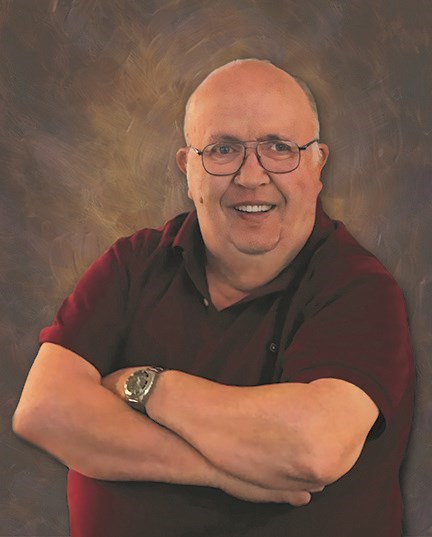 Obituary of John E. Roy