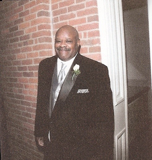 Obituary of Reginald D. Dixon