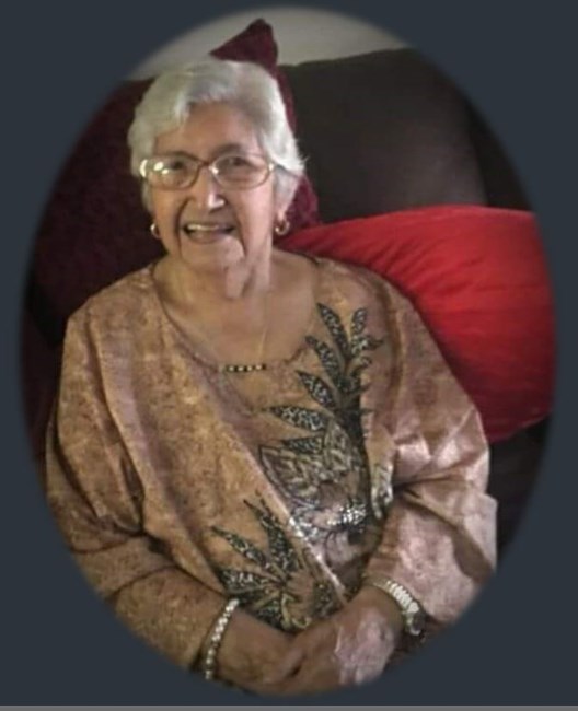 Obituary of Luz M. Reyes