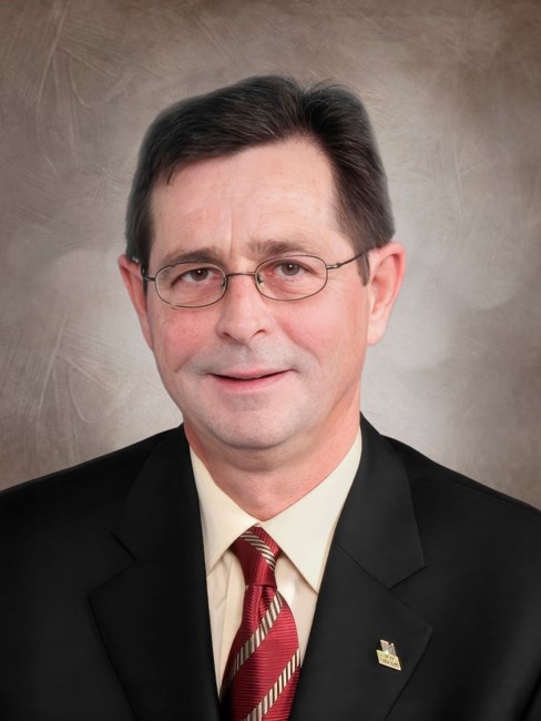 Obituary of Gérald Scullion