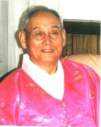 Obituary of Sang Man Kim