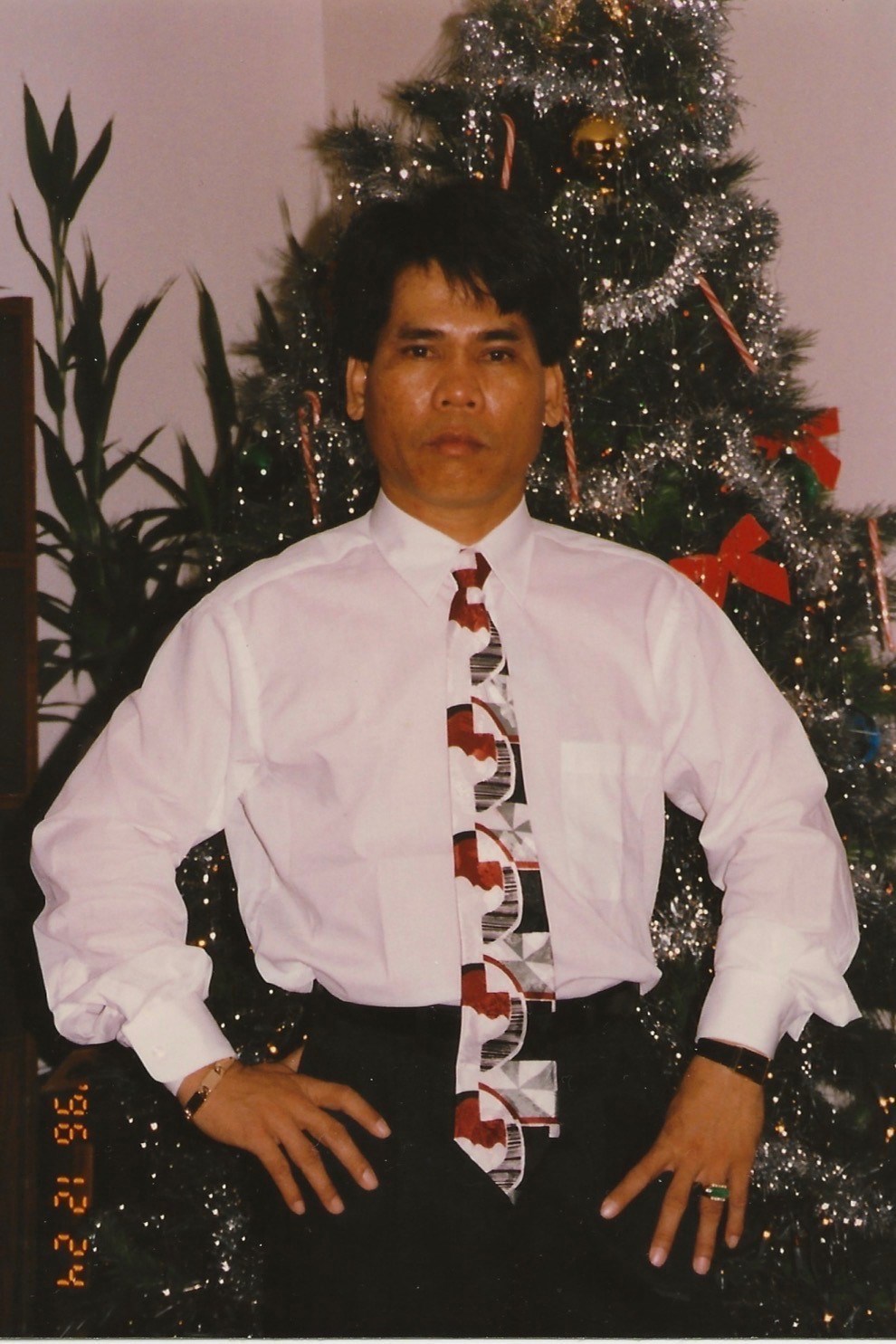 Obituary of Mang Tran
