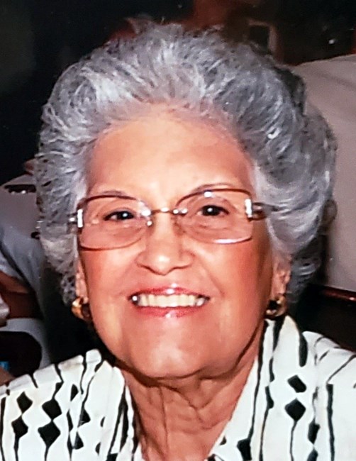 Obituario de Olga M. Menes