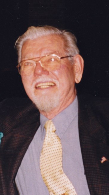 Obituary of Raymond A Mills