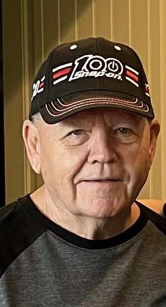 Obituary of George W Tomlinson