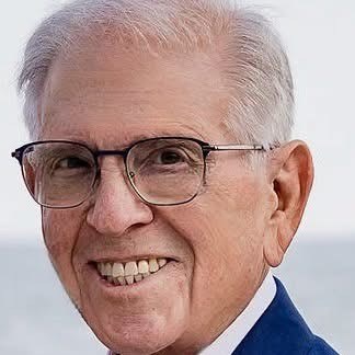 Obituary of Howard Woolf