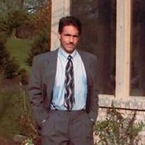 Obituary of John E. Jacobs