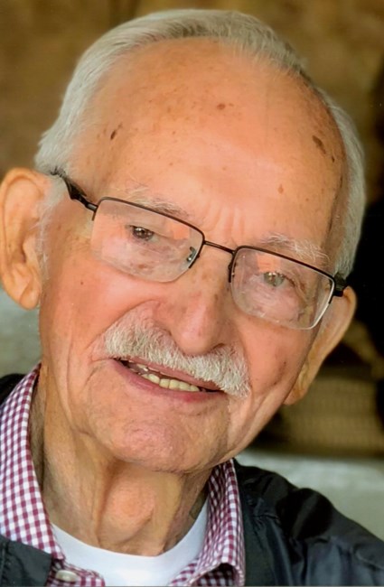 Obituario de James E. Hughes