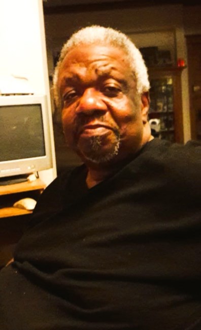 Obituary of Ernest L Ellis