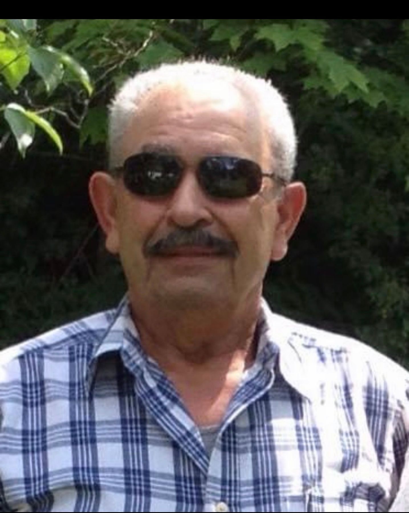 Obituary of Manuel D. Milhomens