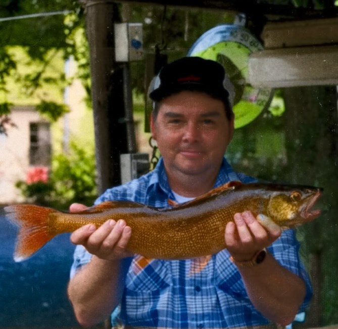 Obituary of John D Carey