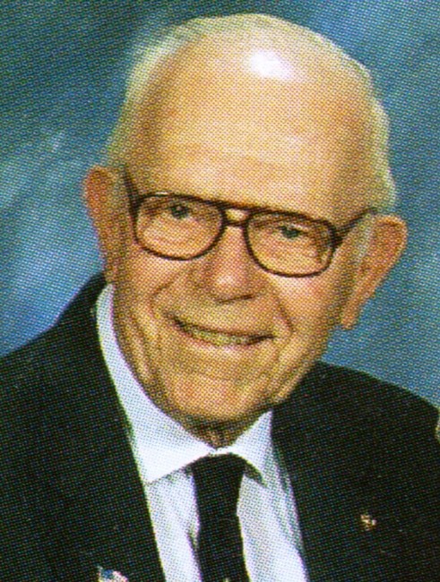 Obituary of John H Mitchell