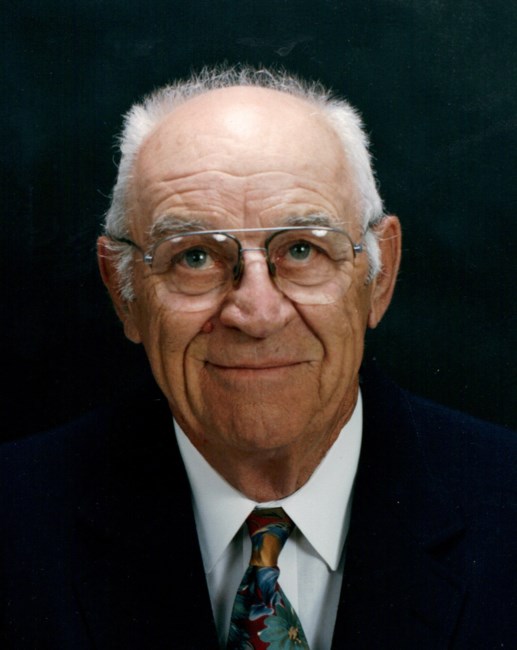 Obituary of Allen E.H. Plambeck