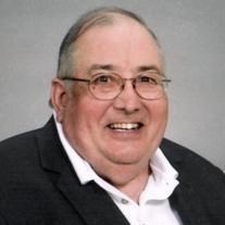 Obituary of James Edward Huggins