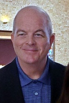 Obituary of Daniel E. Carroll