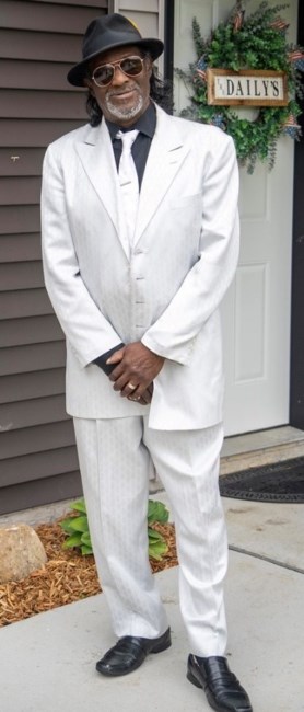 Obituario de John "Johnnie" L. Henderson