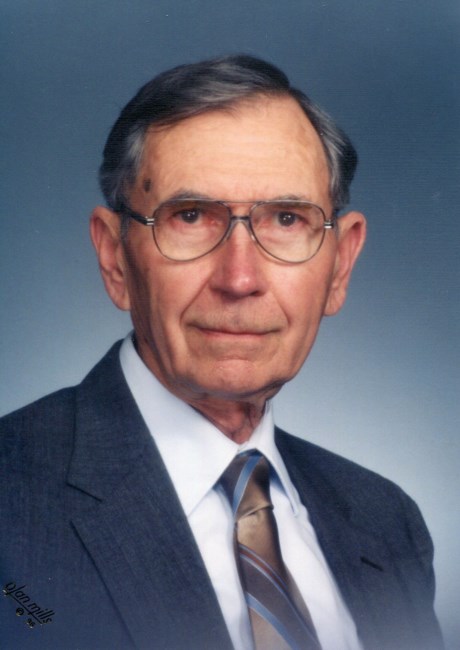 Obituary of George E. Chisholm