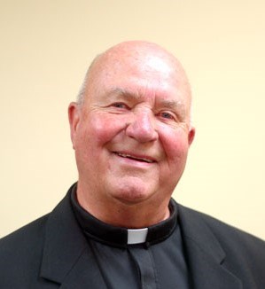 Obituario de Father John J. McCormack