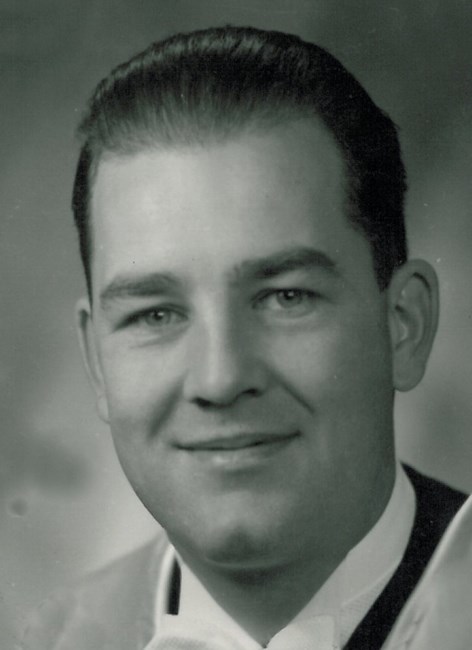 Obituary of Robert M Holmes